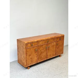Poplar Burl Sideboard with Bronze Fittings in rust — in a room setting