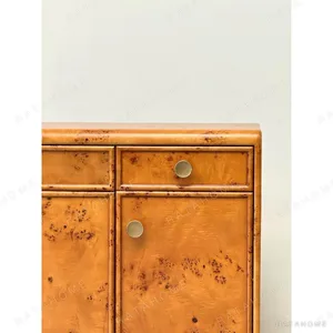 Poplar Burl Sideboard with Bronze Fittings in rust — in a room setting