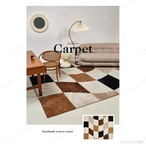 Brown, Black and Cream Wavy Checkerboard Rug in clay — in a room setting
