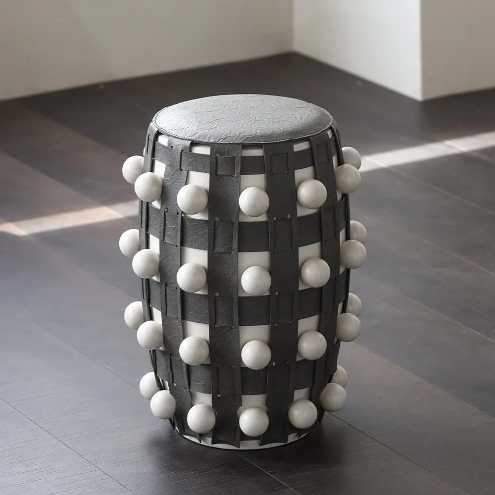 Brown and White Beaded Leather Drum Stool in clay — front view