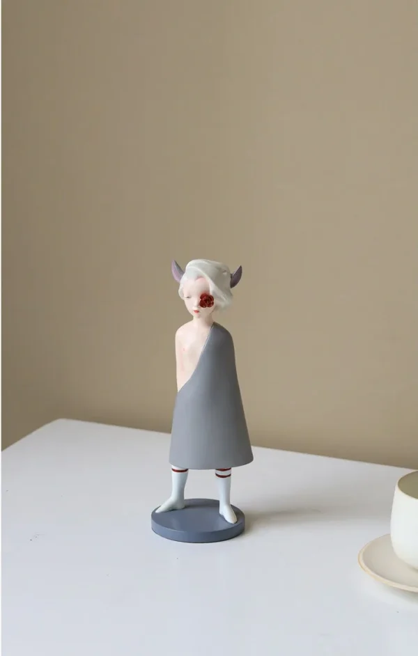 Bubble Gum Artist Figurine in Blue Cape, Gift Boxed — in a room setting