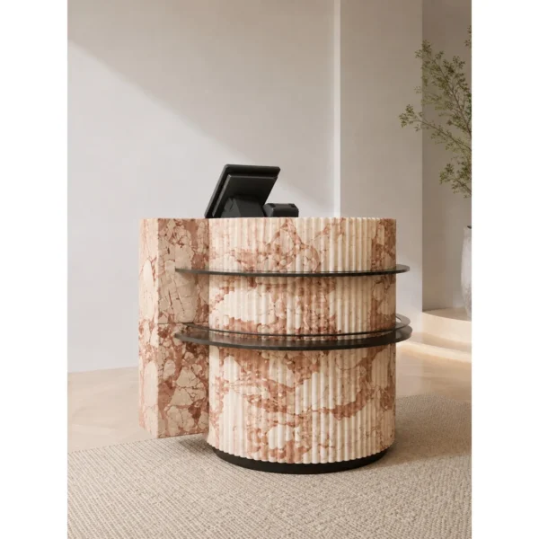 Pink Marble Curved Reception Desk with Black Metal Trim in rose stone — in a room setting