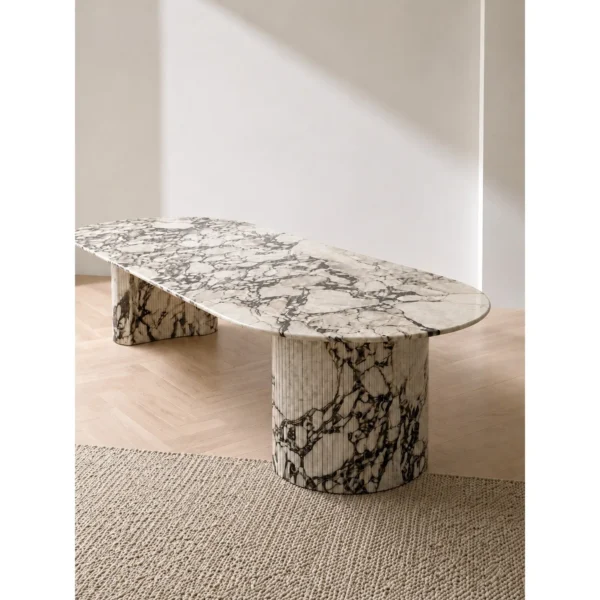 Purple-Veined Italian Marble Oval Coffee Table in oatmeal — in a room setting