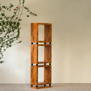 Burl Veneer Tall Bookshelf with Black Stud Detail in clay — front view