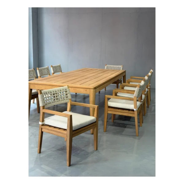 Burmese Teak Outdoor Long Table with Woven Armchairs, 300 cm in natural oak — in a room setting