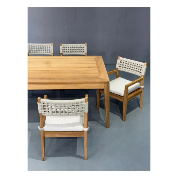 Burmese Teak Outdoor Long Table with Woven Armchairs, 300 cm in natural oak — in a room setting