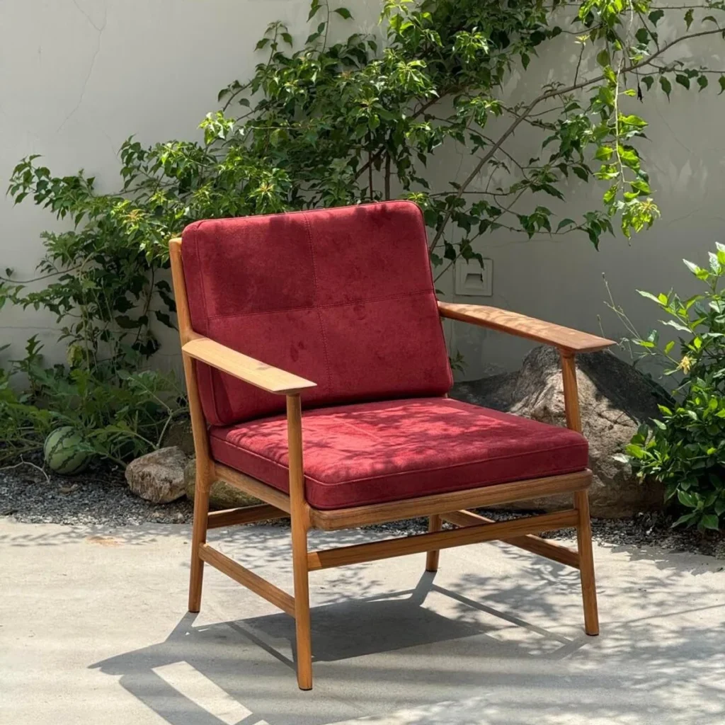 Burmese Teak Lounge Chair in Sappan Red Suede — front view