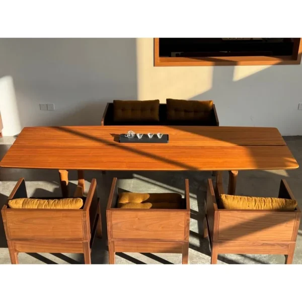 Tongzhou Burmese Teak Long Table with Chairs in natural oak — in a room setting