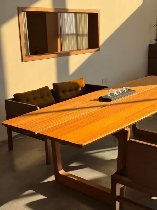 Tongzhou Burmese Teak Long Table with Chairs in natural oak — in a room setting