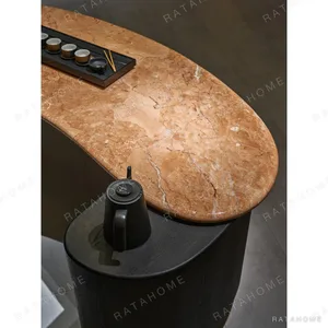 Orange Ice Jade Stone Business Tea Table in rust — in a room setting