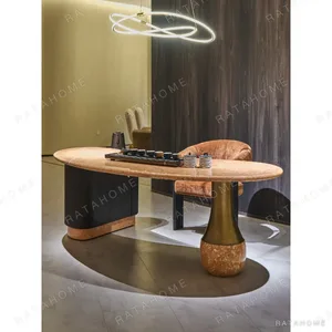 Orange Ice Jade Stone Business Tea Table in rust — in a room setting