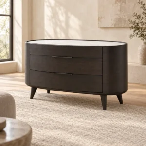 Oval Dark Veneer Sideboard with Jazz White Marble Top in black — in a room setting