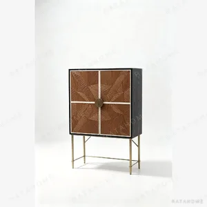 Callahan Carved Sunburst Cabinet on Brass Legs in walnut — in a room setting