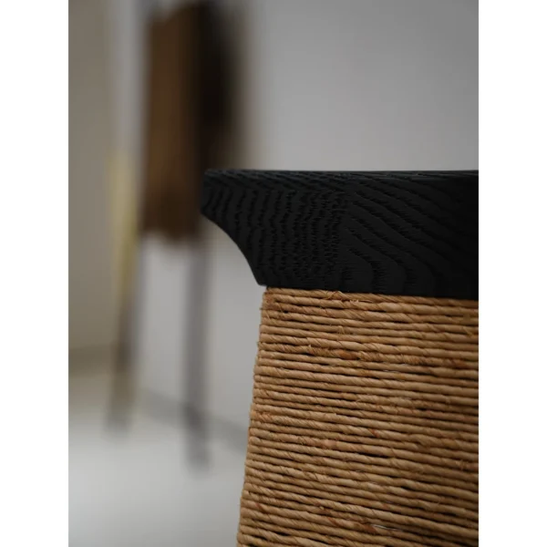 Cambon Black Oak Dining Chair with Woven Leather-Cord Back in black — in a room setting