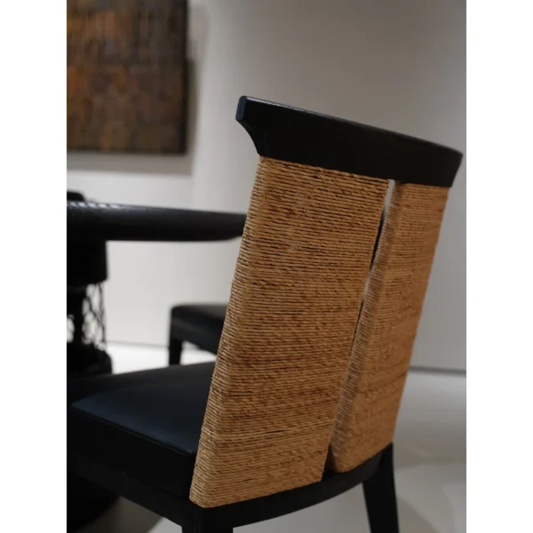 Cambon Black Oak Dining Chair with Woven Leather-Cord Back in black — in a room setting