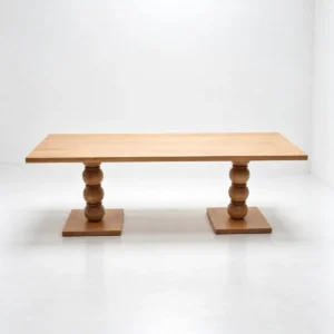 Beaded-Leg Ash Long Dining Table in natural oak — front view