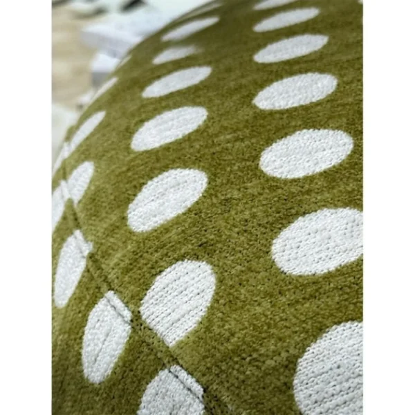 Candy Swivel Lounge Chair in olive — in a room setting