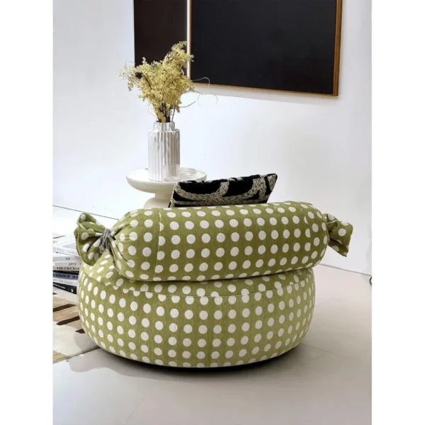 Candy Swivel Lounge Chair in olive — in a room setting