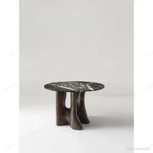 Cangyan Green Marble Side Table on Sculpted Grey Base in olive — in a room setting