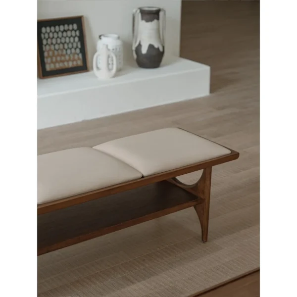 Capu Teak Bench Table with Three Removable Cushions in walnut — in a room setting