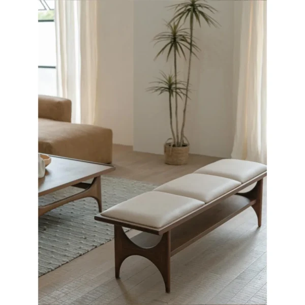 Capu Teak Bench Table with Three Removable Cushions in walnut — in a room setting