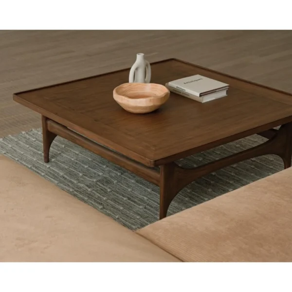 Capu Teak Square Coffee Table with Sculpted Legs in walnut — in a room setting