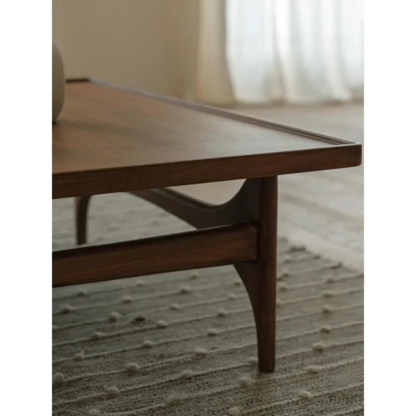 Capu Teak Square Coffee Table with Sculpted Legs in walnut — in a room setting