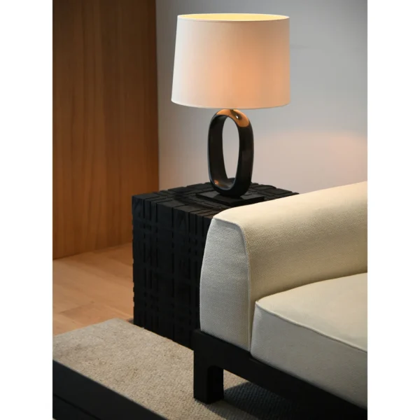 Carved Black Oak Cube Side Table, 50 cm in black — in a room setting