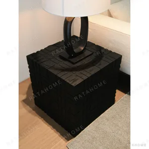 Carved Black Oak Cube Side Table, 50 cm in black — in a room setting