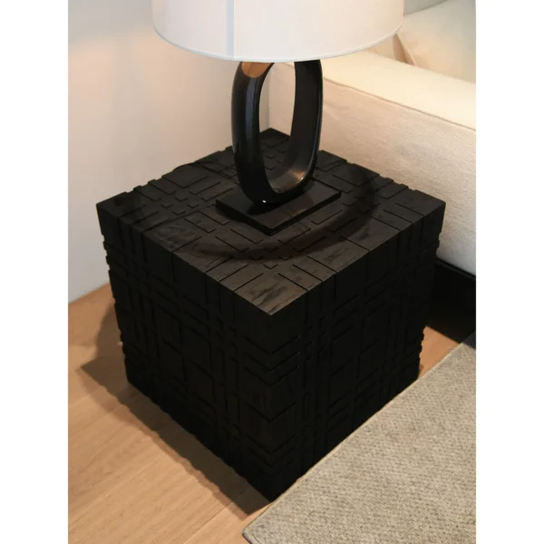 Carved Black Oak Cube Side Table, 50 cm in black — in a room setting