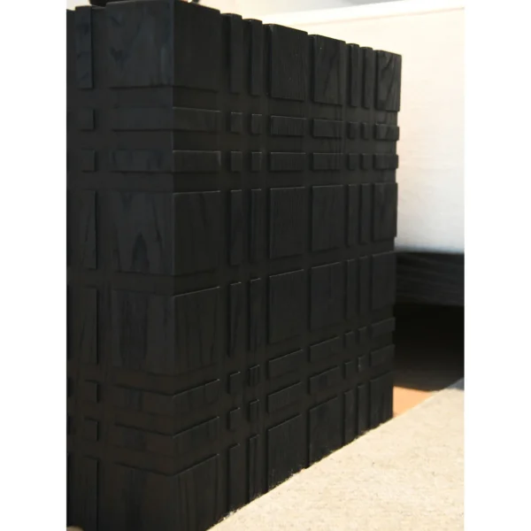 Carved Black Oak Cube Side Table, 50 cm in black — in a room setting