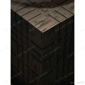 Carved Black Oak Cube Side Table, 50 cm in black — in a room setting