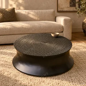 Carved Sunflower Round Coffee Table in Black, 89.5 cm — in a room setting