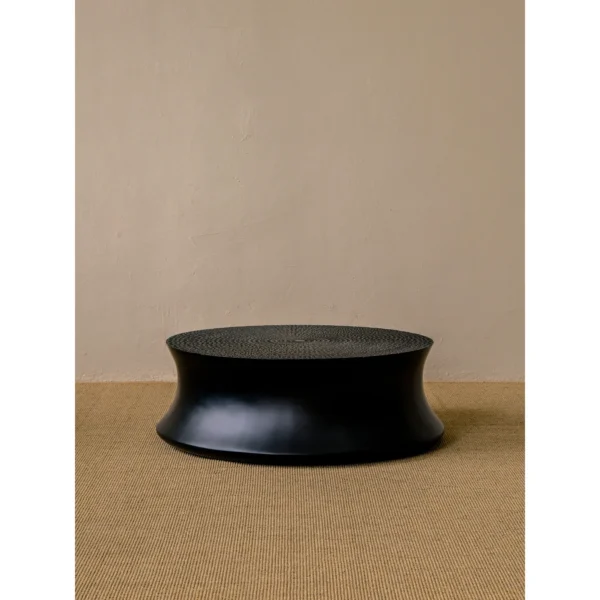 Carved Sunflower Round Coffee Table in Black, 89.5 cm — in a room setting