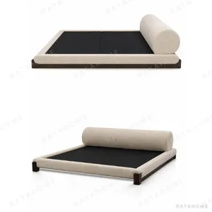 Cedric Upholstered Bed with Walnut Block Legs in sand — in a room setting