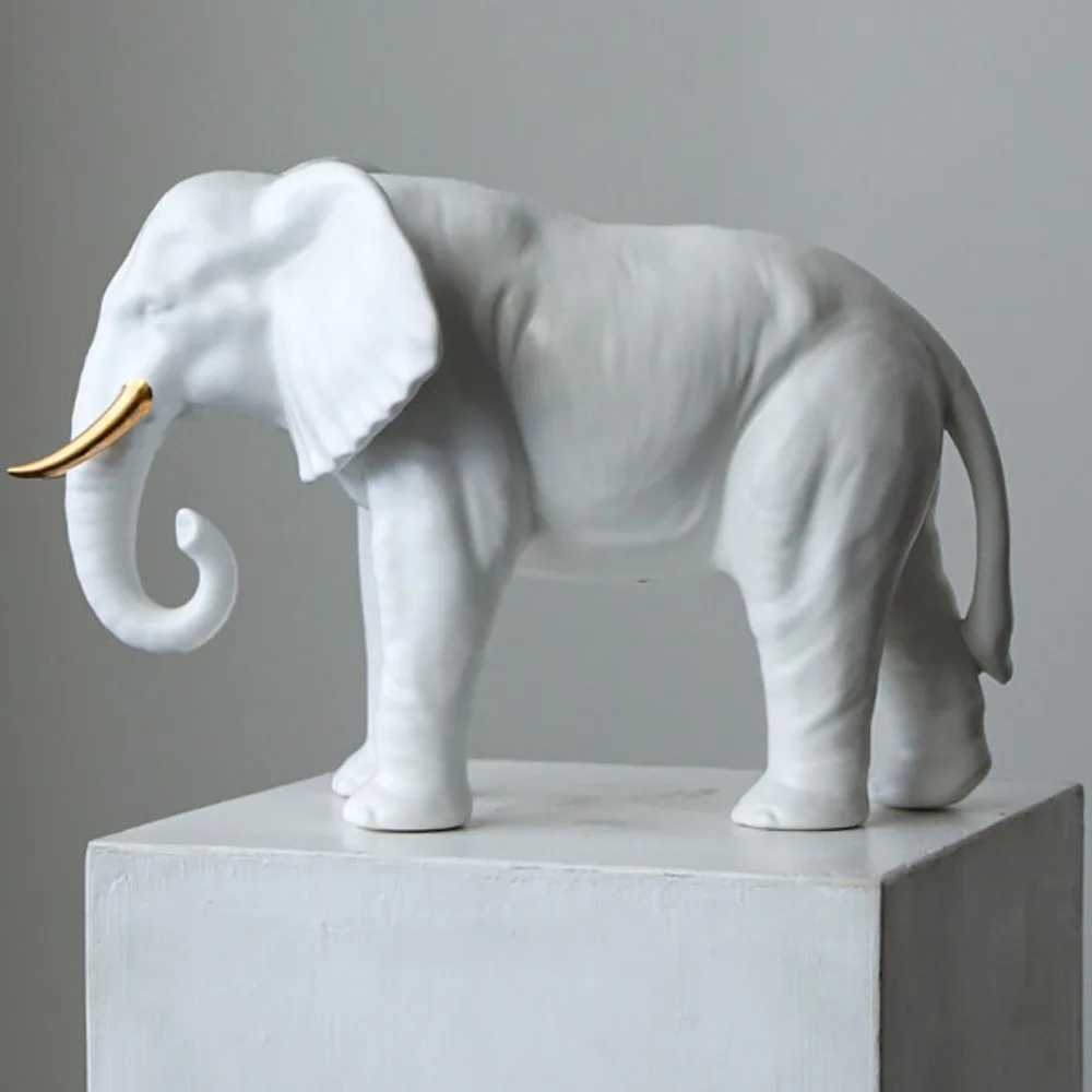 White Ceramic Elephant Sculpture in ivory — front view