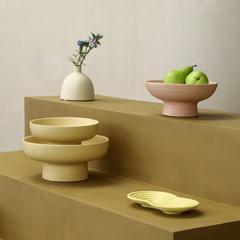 Ceramic Footed Fruit Plates in oatmeal — front view