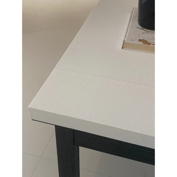 Charbon Black Oak Nightstand with Lacquered Top in black — in a room setting