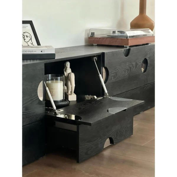 Cheese Low Cabinet in Black with Mirror Dot Inlays — in a room setting