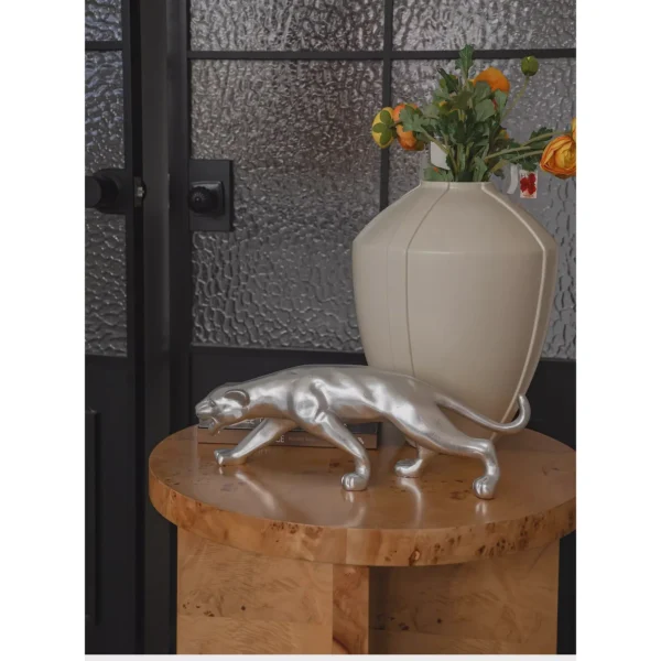 Prowling Cheetah Sculpture in Matte Black or Silver — in a room setting