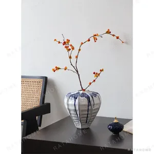 Jingdezhen White Lobed Jar Vase in ivory — in a room setting