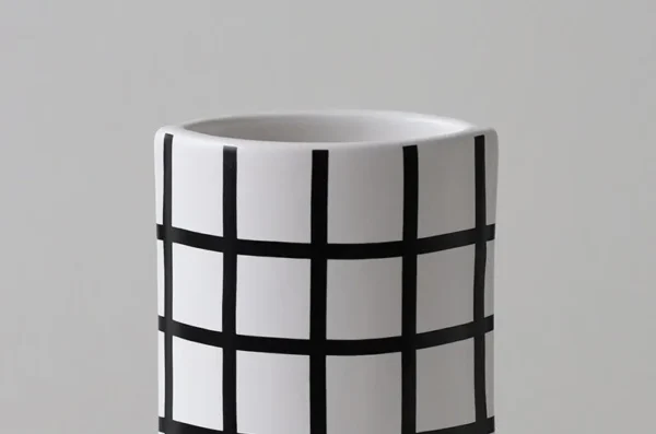 Black and White Polka Dot Sculptural Ceramic Vase, Large or in ivory — in a room setting