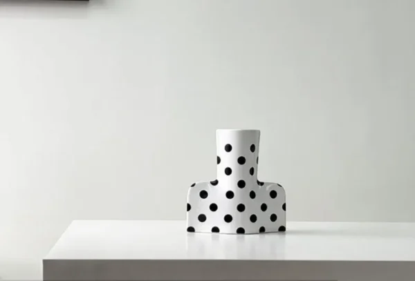 Black and White Polka Dot Sculptural Ceramic Vase, Large or in ivory — in a room setting