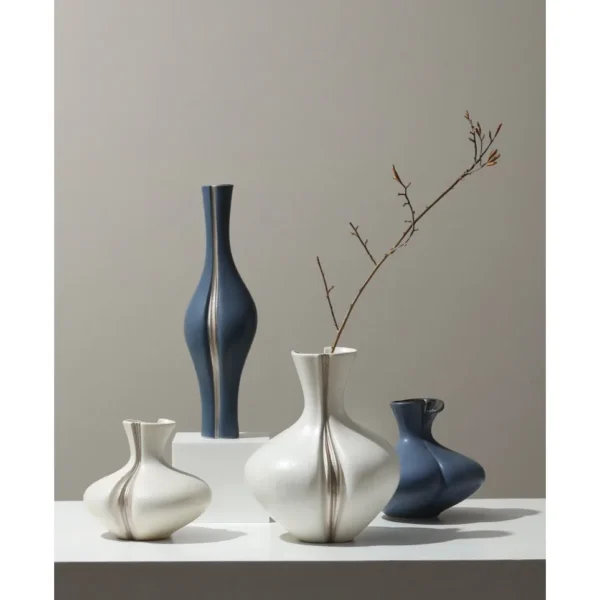 Sculptural Ceramic Bud Vases in Cream and Navy, Three Sizes — in a room setting
