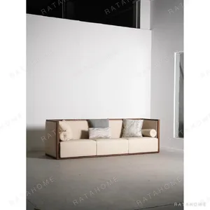 New Chinese Ash Frame Sofa with Mixed Fabric Cushions in walnut — in a room setting
