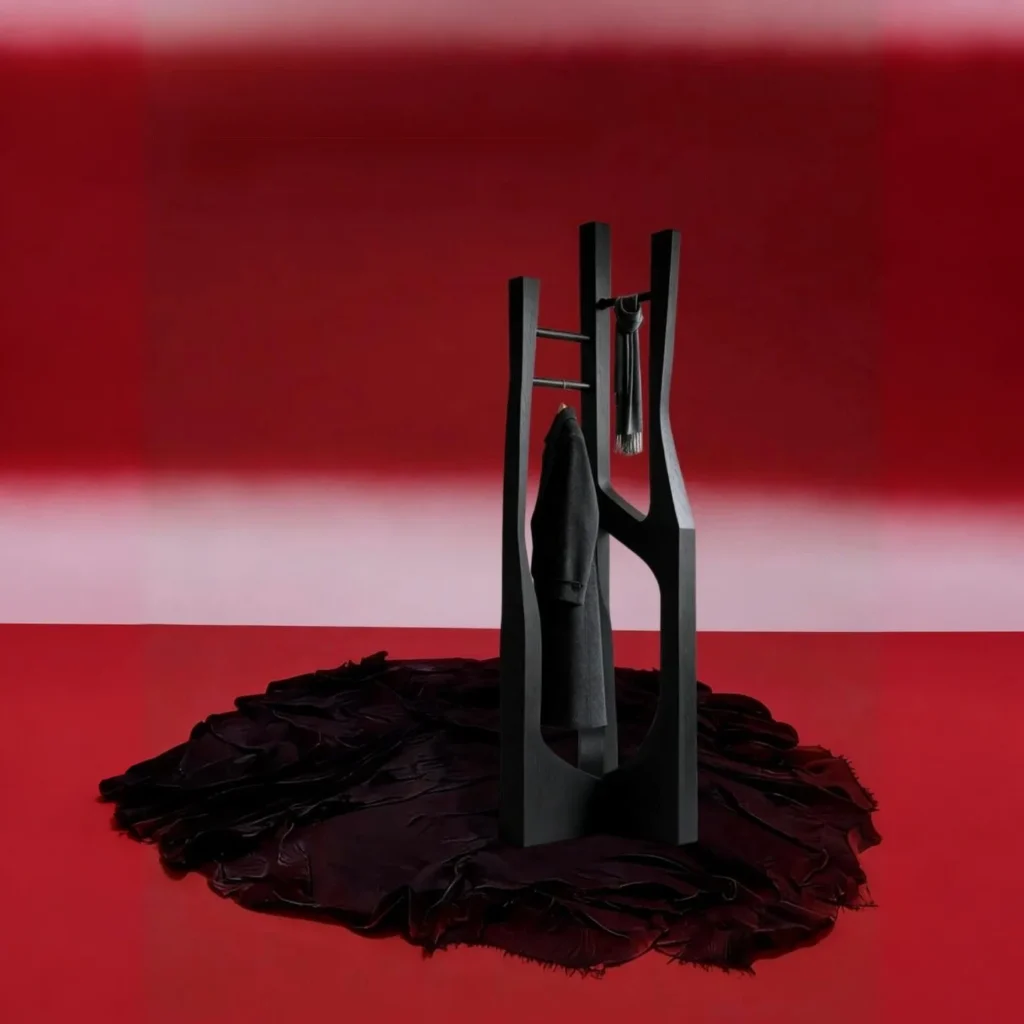 Chuan Sculptural Clothes Rack in Black Wood — front view