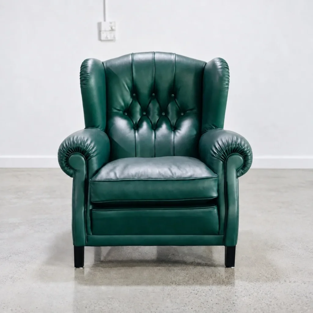 Cigar Wingback Armchair in Emerald Green Leather — front view