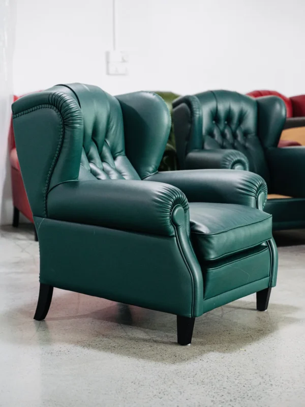 Cigar Wingback Armchair in Emerald Green Leather — in a room setting