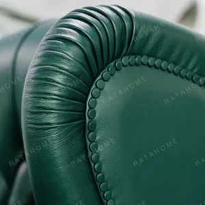 Cigar Wingback Armchair in Emerald Green Leather — detail