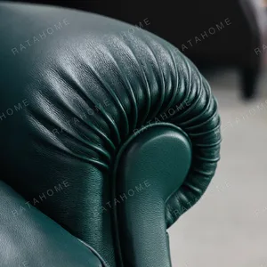 Cigar Wingback Armchair in Emerald Green Leather — detail